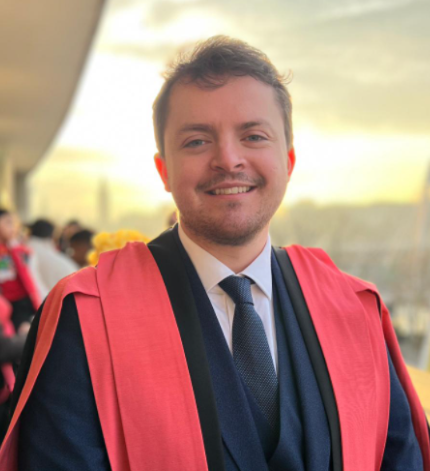 George in graduation gown